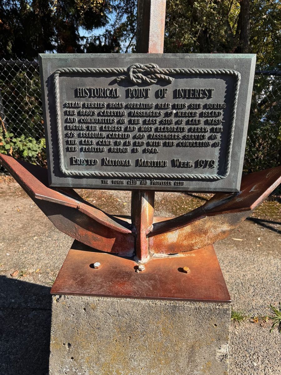 A bronze historical plaque on an anchor base about the Leschi steam ferries