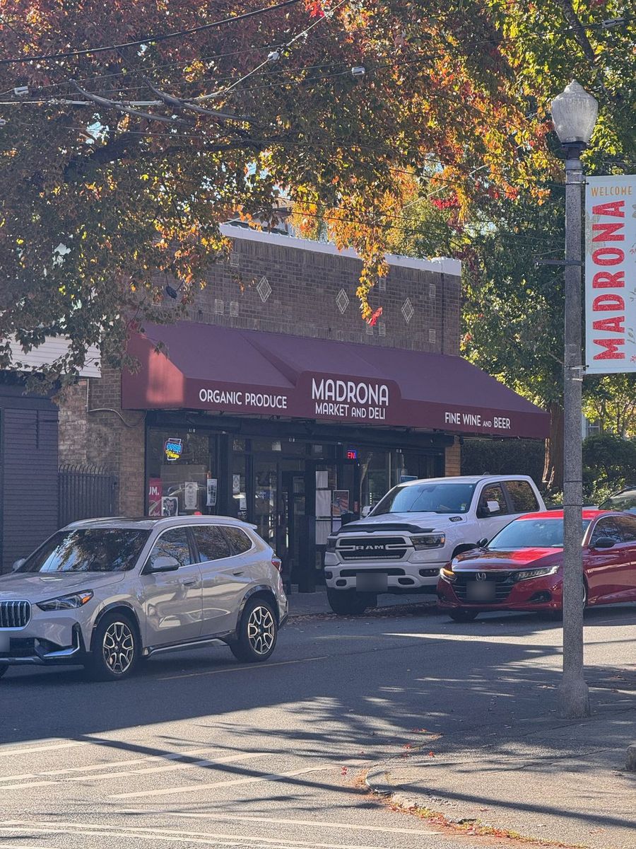 Madrona Market and Deli's maroon awning on 34th Ave